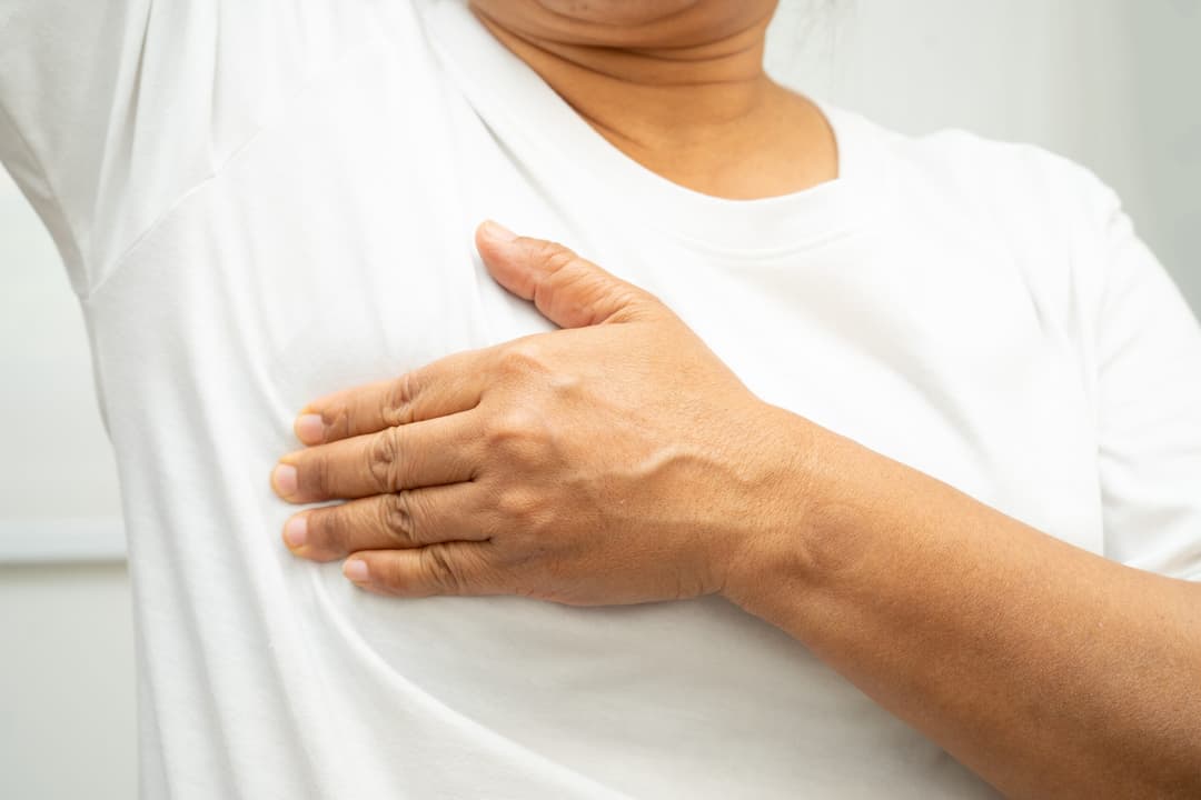 Asian,Woman,Patient,Checking,And,Worry,Her,Breast,,Breast,Self